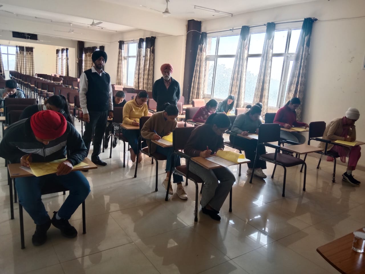 On 15th Feb, 2023 (Wesdrsday) a Moral Education Exam was conducted by Guru Gobind Singh Study Circle which is affiliated with P.S.E.B. curriculum. The Exam was conducted in the College premises. The sole aim of the exam is to inculcate and develop the moral, ethical etiquette in the students. This exam was dedicated towards 550th Birthday Anniversary of Shri Guru Nanak Dev Ji. A total of 32 students from the College participated in this Exam. The exam was conducted under the able supervision of our Dean Dr. Rajeev and Mr. Harkamal Deep singh.HOD,EE with the consent of Chairman Sir Mr. SP Singh Ji. All the students took keen interest in attempting the questions based on moral knowledge. Moreover this type of exams helps the students to be socially responsible and well mannered persons in their lives.